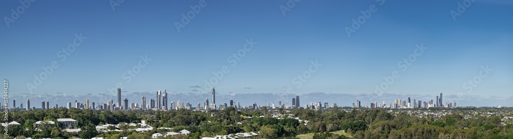 Fototapeta premium Gold Coast city skyline against blue sky, pano panorama banner, Queensland, Australia