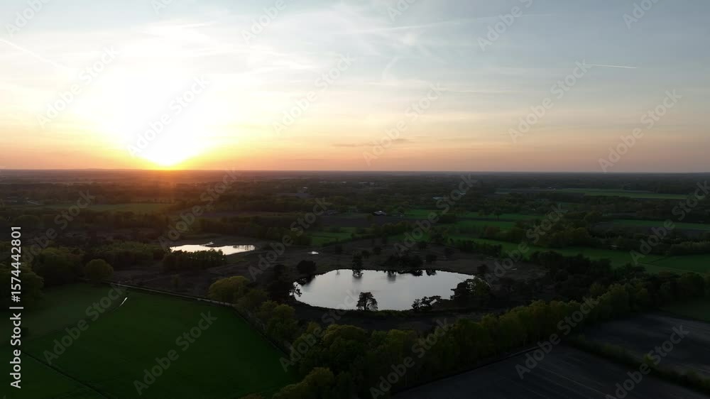Golden Hour Aerial View of Lakes and Rural Landscape Golden Hour Aerial View of Lakes and Rural Landscape