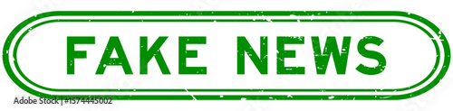 Grunge green fake news word rubber seal stamp on white background