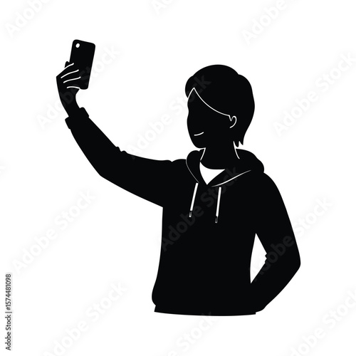 Black silhouette of a young person taking a selfie with a smartphone youth male
