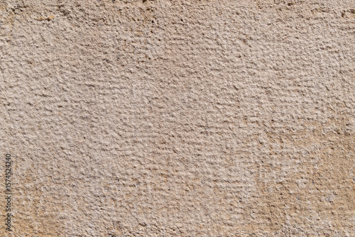 Wallpaper Mural Textured beige stone surface with subtle grid pattern Torontodigital.ca