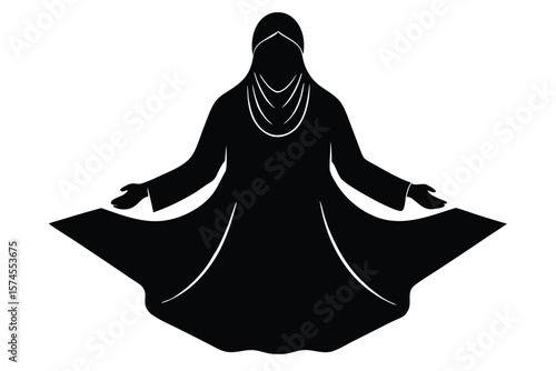 Silhouette of a woman in a flowing dress and hijab with open arms