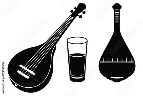Traditional musical instruments and a glass of drink