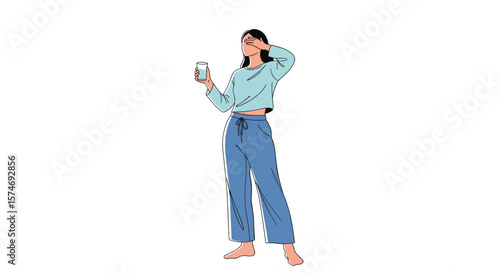 A young woman in casual clothing stands barefoot holding a glass of water and touching her forehead