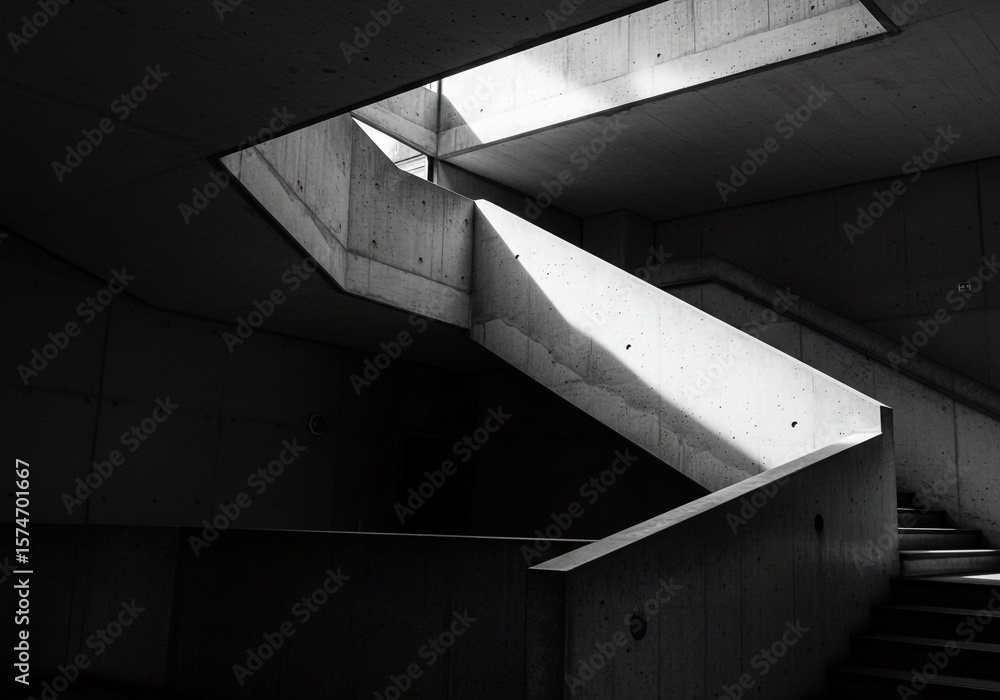 Fototapeta premium Concrete Staircase with Skylight in Black and White