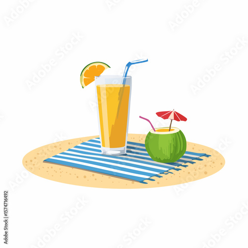 Beach towel and tropical drink on sand