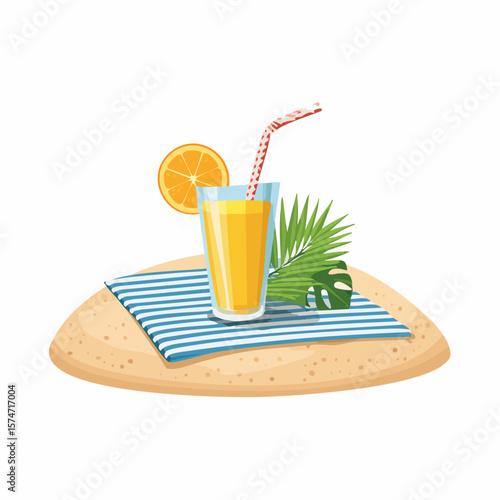 Beach towel and tropical drink on sand