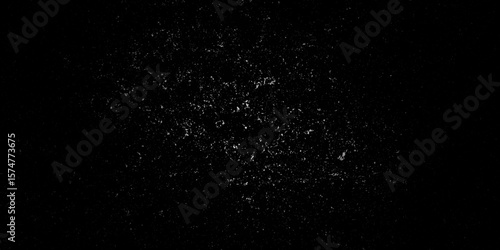 Grungy black surface with numerous white crack and scratches and dust particles distressed background. abstract chalk rubbed out on blackboard for background. dirty grunge texture vector. black paper.