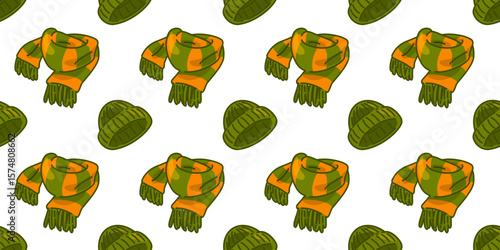 Seamless Knitted Scarf Hat Pattern. Green and orange striped scarves and matching knitted beanies repeating on a white background. Cozy flat cartoon design for autumn and winter themes.