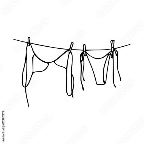 swimwear hanging on a clothesline