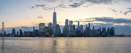 Panorama of the skyline of Lower Manhattan with the famous World Trade Center before sunrise