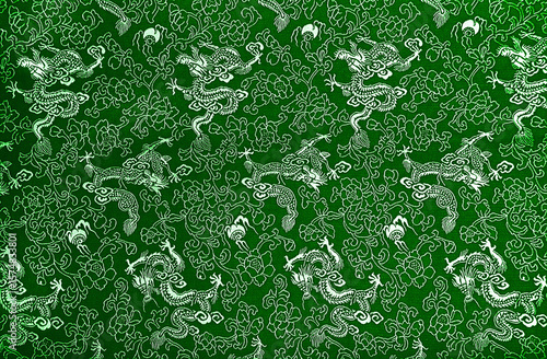 Texture of green traditional chinese silk with dragons