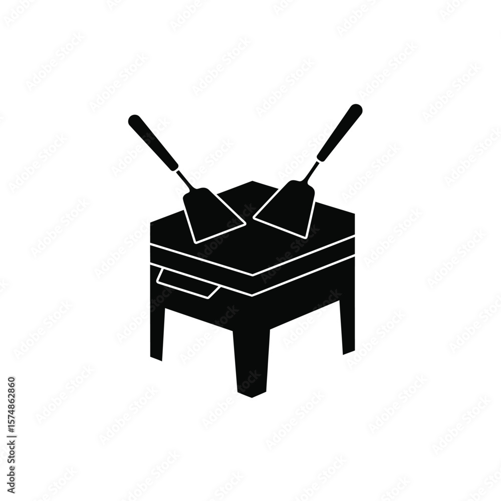 Fototapeta premium Black silhouette of two spatulas on a grill cooking
