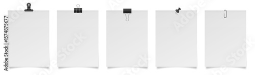 Set of large paper notes with binder clips, bulldog clip, paper clip and push pin. White sheets of paper. Black holders	