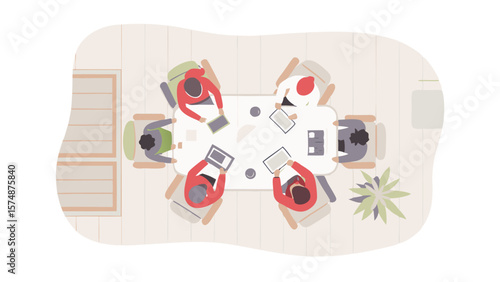 Overhead view of a meeting with six people around a table using laptops and tablets inside room