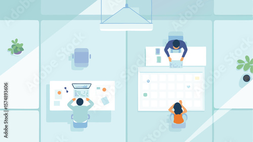 Overhead view of a modern office space with employees working at desks and plants for decoration space