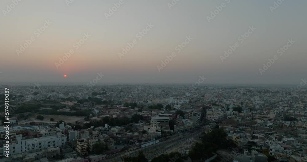 Aerial view of cityscape at sunset, India. Aerial view of cityscape at sunset, India.