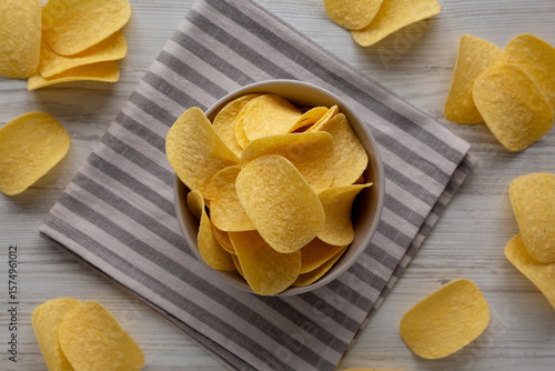 Potato Chips in a Bowl, top view. Flat lay, overhead, from above.