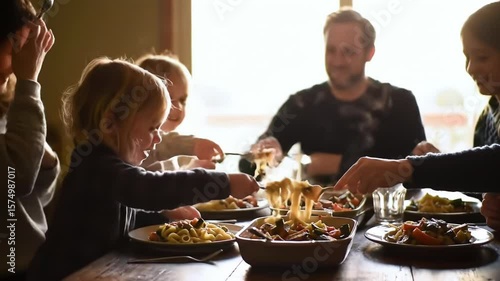 Family members gather around rustic wooden table enjoying delicious warm homemade meal together