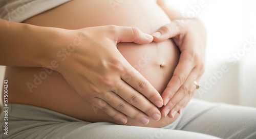 Wallpaper Mural Pregnant woman holding her belly, expressing love and connection Torontodigital.ca