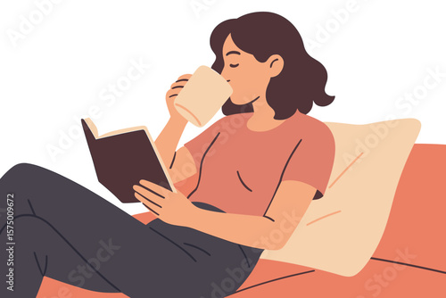 Relaxed woman reading and sipping coffee on cozy couch