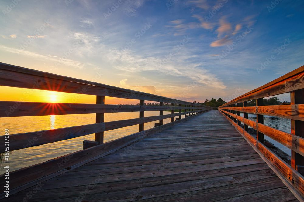 Obraz premium Wood bridge at sunset in Woodbine, Georgia.