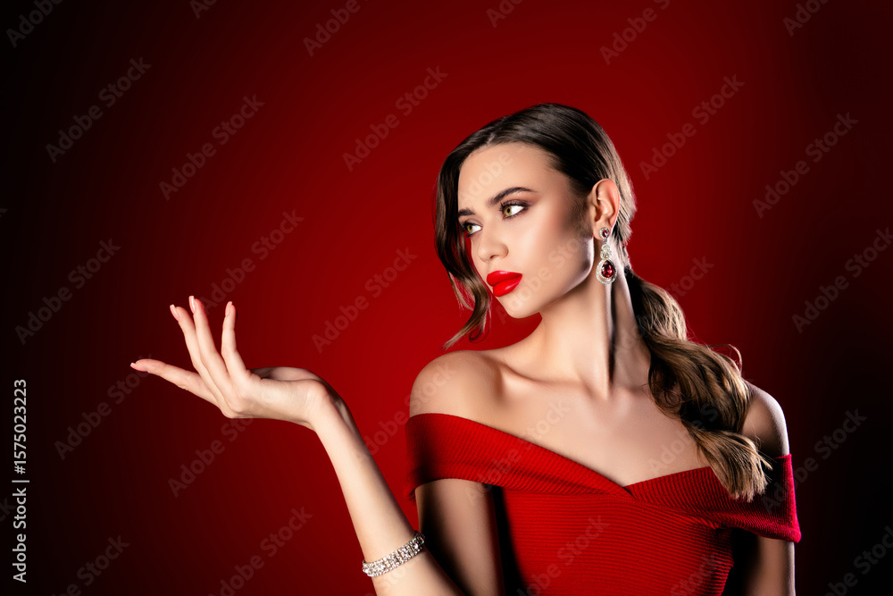 Naklejka premium Elegant woman in a chic red dress, showcasing beauty and sophistication with striking jewelry and glamorous style