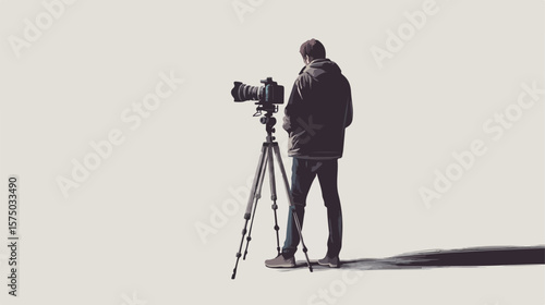 Professional Cameraman with Camera Standing Outdoors