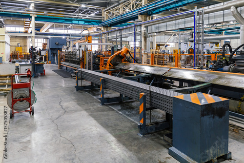 Metalworking factory production line. Production of metal profile cable canals