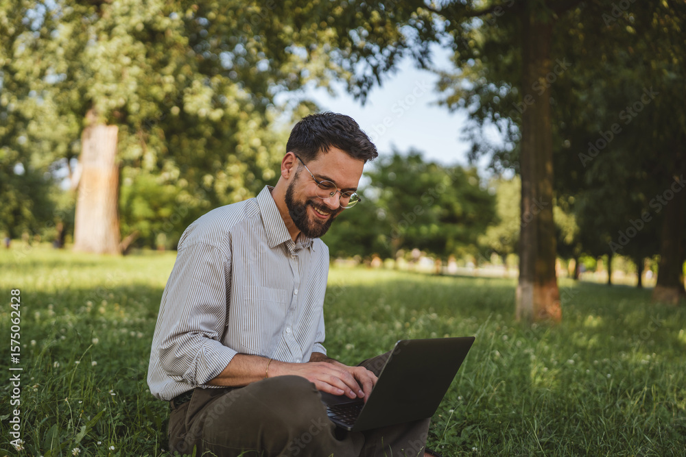 businessman sit on grass in nature and use laptop for work or leisure businessman sit on grass in nature and use laptop for work or leisure