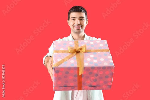 Happy young man with birthd...