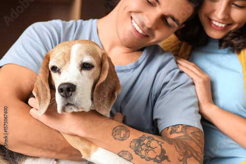 Young couple with cute Beag...