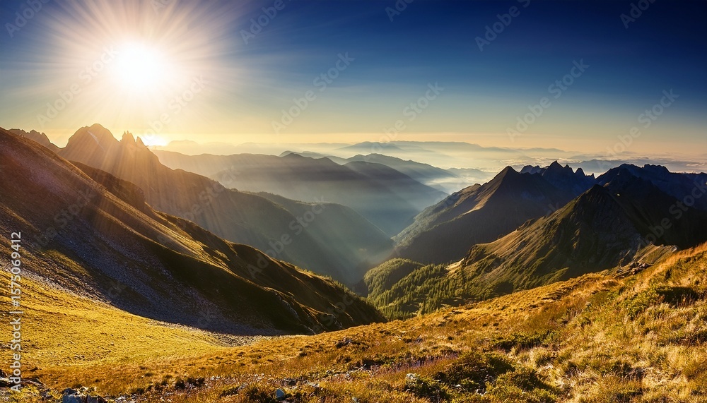 Obraz premium stunning mountain landscape with wildflowers and rolling hills at sunset