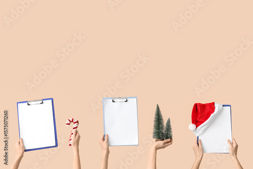Hands holding clipboards an...