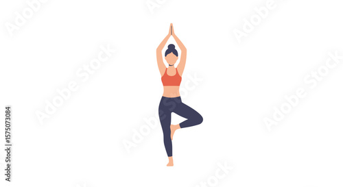 Woman in tree pose with hands in prayer position above her head yoga