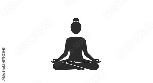 Silhouette of a woman in lotus position meditating with hands on knees
