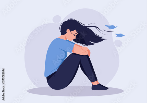 A vector illustration depicts a sad woman sitting with her knees to her chest, her head bowed, conveying feelings of loneliness and emotional distress against a soft, abstract background.