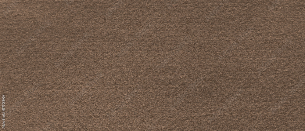 Fototapeta premium Brown fabric background texture. Brown felt abstract background with copy space for design. 