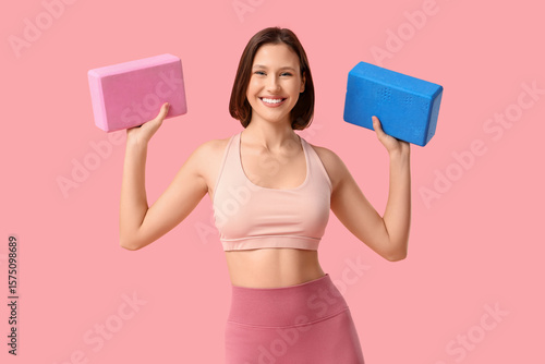 Sporty young woman with yog...
