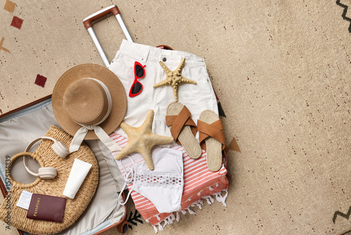 Packed suitcase with starfi...