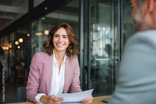 Woman smiles warmly during job interview