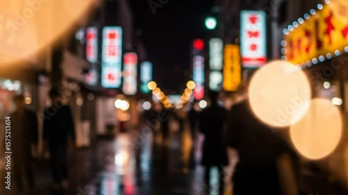 Wallpaper Mural Nighttime City Street Scene with Blurred Neon Signs and Pedestrians Walking in Rainy Conditions Torontodigital.ca