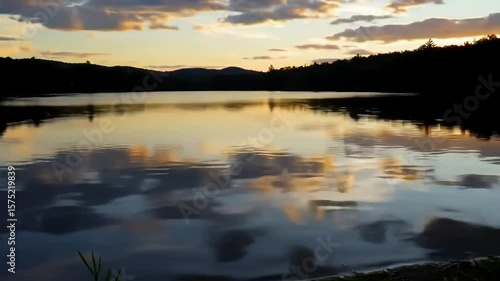 Wallpaper Mural Scenic Lake Reflection at Sunset with Beautiful Clouds and Mountain Silhouette Tranquil Ambiance Torontodigital.ca