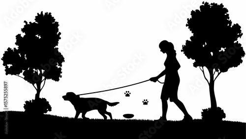Silhouette of a woman walking a dog in a park with trees and paw prints on a leash in black and white