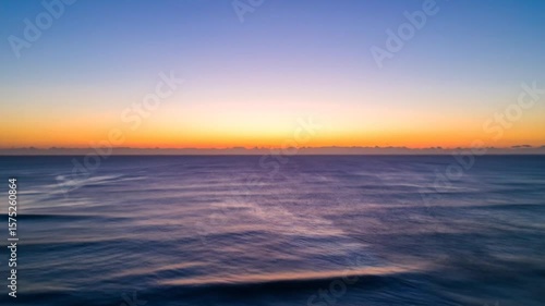 Sunrise over a calm ocean