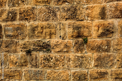 The surface of a wall built with ashlar stones