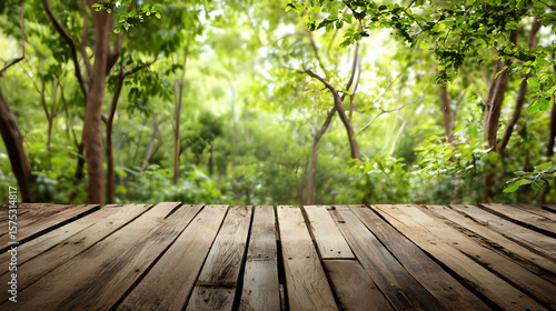 Wooden plank stage amidst green foliage background showcasing a vibrant forest scene ideal for product display nature