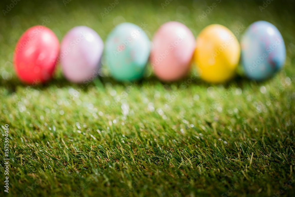 Fototapeta premium Colorful Easter eggs on grass
