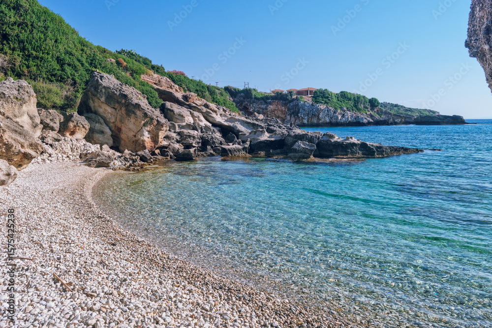 Obraz premium Turqouise waters at Porto Skala Beac - the best beach for snorkeling in Southern Kefalonia near Poros and Skala, Kefalonia island, Greece