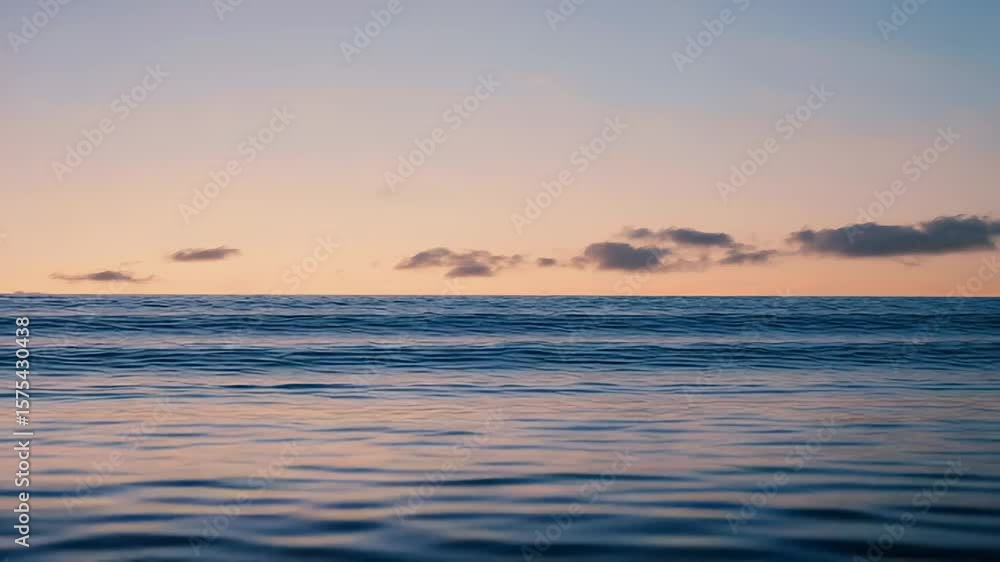 Pastel colors painting the sky during a calm ocean sunset Pastel colors painting the sky during a calm ocean sunset